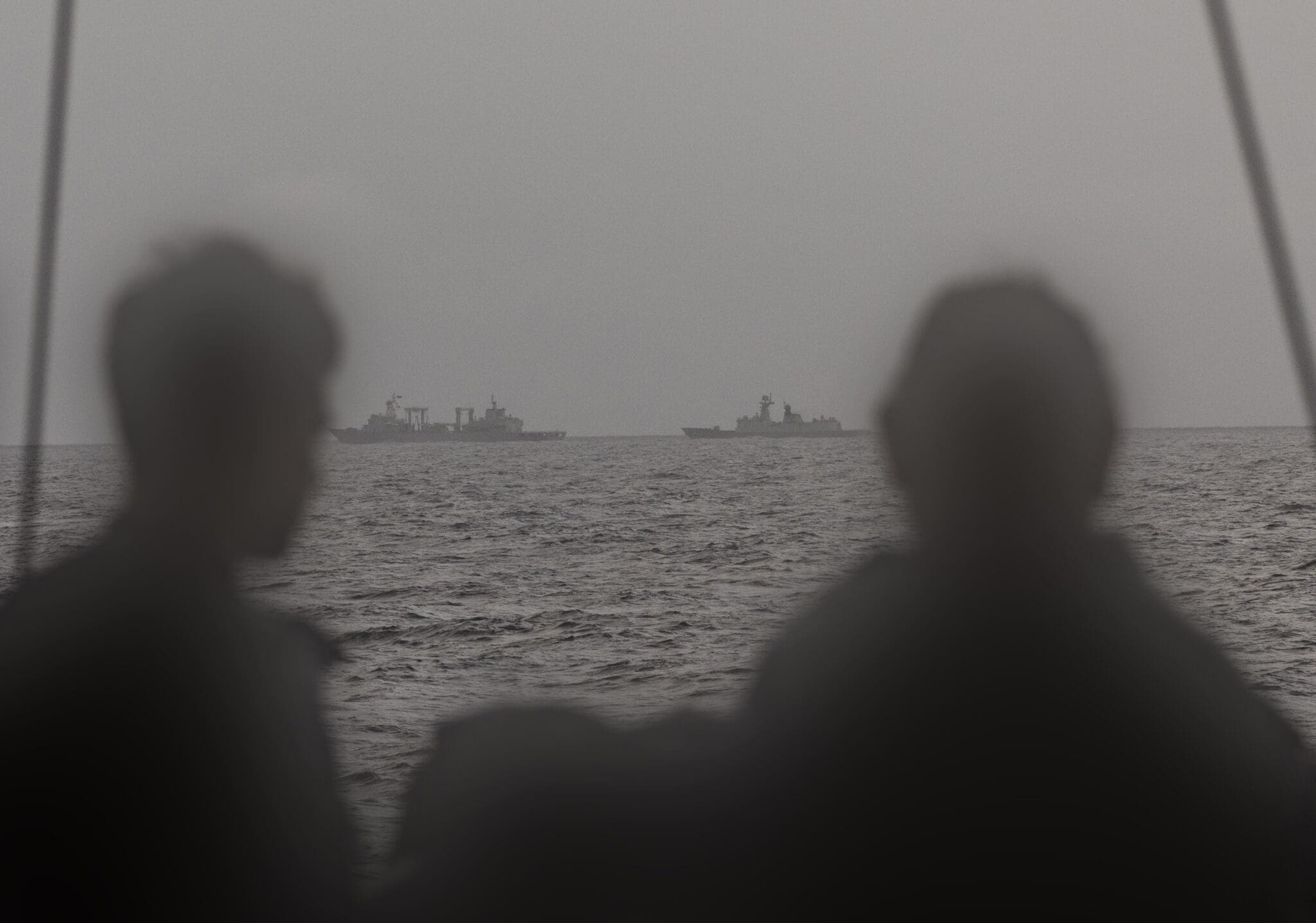 Royal Australian Navy sailors on HMAS Arunta keeping watch on People's Liberation Army-Navy (PLA-N) Fuchi-class replenishment vessel Weishanhu and Jiangkai-class frigate Hengyang in the Tasman Sea. *** Local Caption *** As part of Australias whole-of-government maritime border protection efforts, Defence routinely monitors all maritime traffic in our Exclusive Economic Zone and maritime approaches. Australia respects the right of all states under international law to exercise freedom of navigation and overflight in international waters and airspace, just as we expect others to respect our right to do the same.