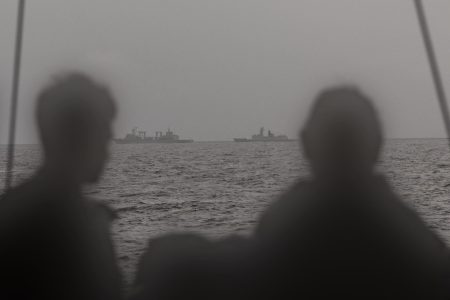 Royal Australian Navy sailors on HMAS Arunta keeping watch on People's Liberation Army-Navy (PLA-N) Fuchi-class replenishment vessel Weishanhu and Jiangkai-class frigate Hengyang in the Tasman Sea. *** Local Caption *** As part of Australias whole-of-government maritime border protection efforts, Defence routinely monitors all maritime traffic in our Exclusive Economic Zone and maritime approaches. Australia respects the right of all states under international law to exercise freedom of navigation and overflight in international waters and airspace, just as we expect others to respect our right to do the same.