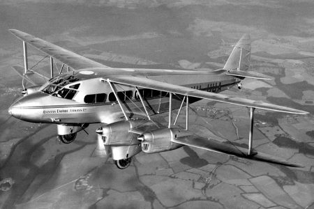Aerial view of a new Qantas DH86 on a test flight over England in 1934
