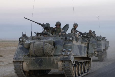 041001-F-2034C-017
U.S. Army armored vehicles leave Samarra after conducting an assault during Operation Baton Rouge in Samarra, Iraq, on Oct. 1, 2004.  Soldiers of the 1st Battalion, 4th Cavalry Regiment, 1st Infantry Division conducted the assault and then surrounded Samarra sealing it off to keep anti-coalition forces from entering or leaving the town.  DoD photo by Staff Sgt. Shane A. Cuomo, U.S. Air Force.  (Released)
